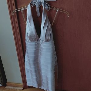 Short dress comes just above the knee, champagne color. Worn once.